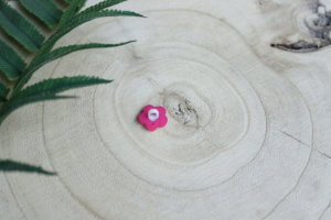 flower pink button